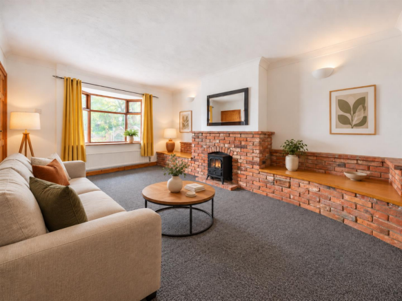 Minimalist Living Room with Brick Fireplace.png