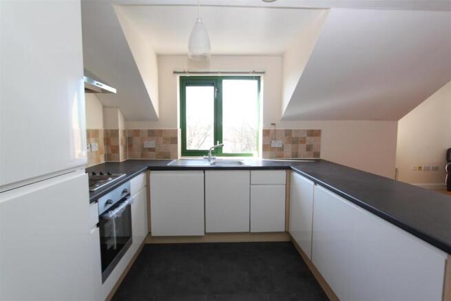 Bright kitchen with ample counter space....