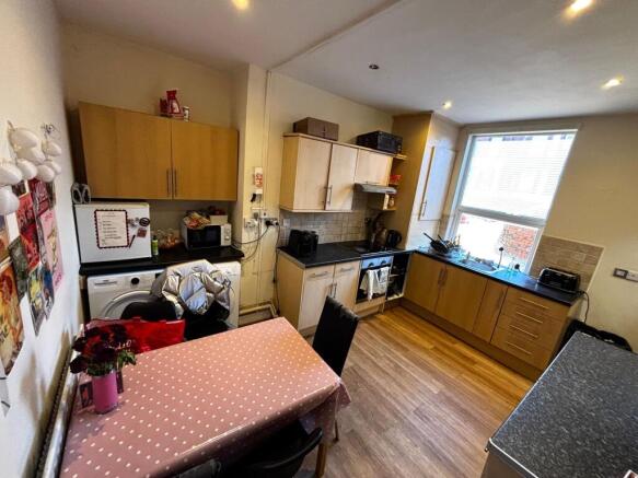 Bright, functional kitchen with generous counte...