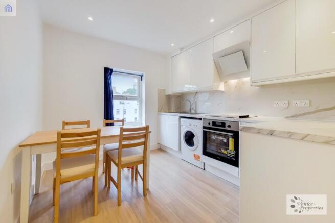 Bright modern kitchen with stylish dining area...