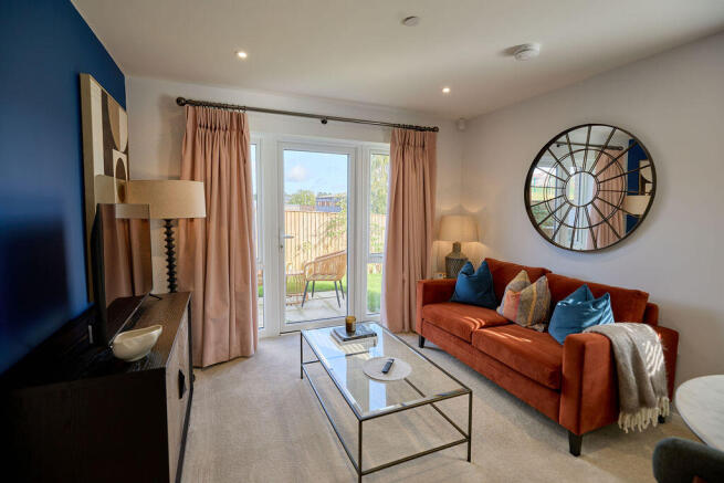 a living room with a large mirror
