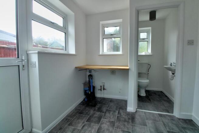 Utility and cloakroom WC