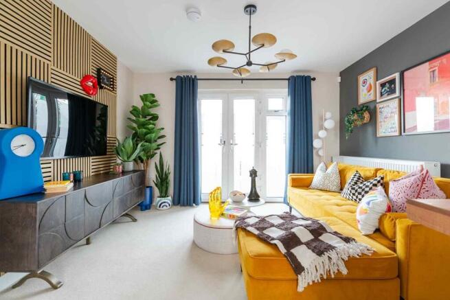 The double doors with Juliet balcony floods the room with natural light