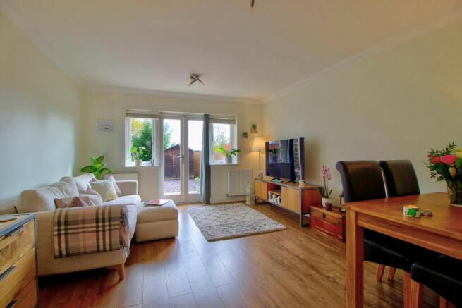French doors open to patio area