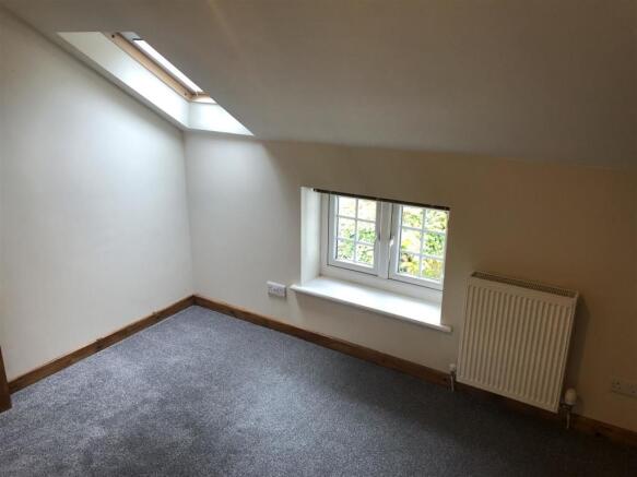 FIRST BEDROOM