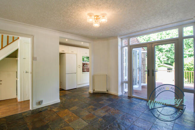 Rear sitting room with French doors to garden & op