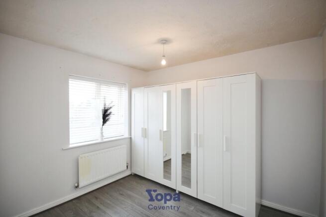 2a45eec7-Bedroom 202.JPG