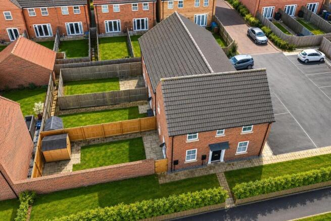 aerial_oblique_drone_like_view_of_a_suburban_resid