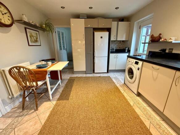 Kitchen, door to garden & dining room