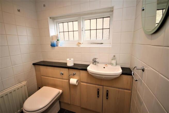 DOWNSTAIRS CLOAKROOM: