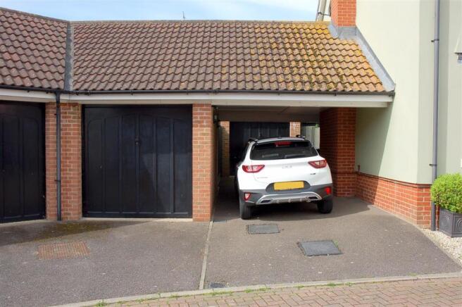 TWO GARAGES AND