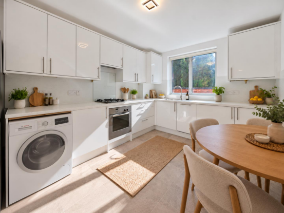 Bright Scandinavian Kitchen with Subtle Washing Ma