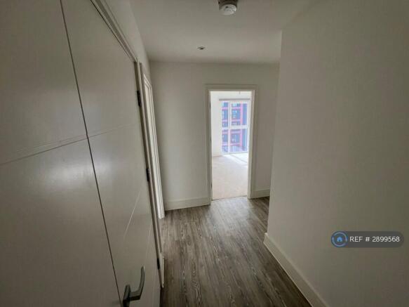 Hallway With Utility To The Left