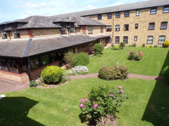 VIEW LOOKING DOWN ONTO COMMUNAL GARDENS