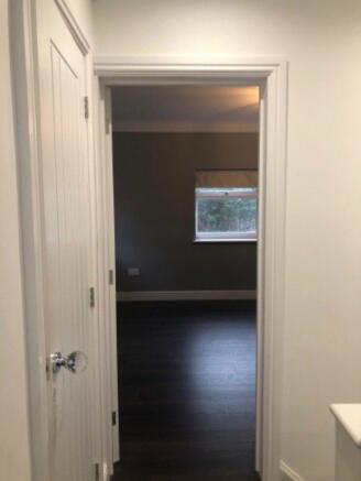 To the right of the stairs is the lounge