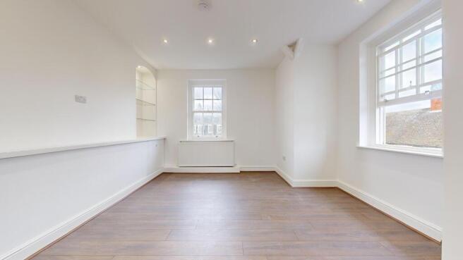 Bright airy living space with modern flooring...