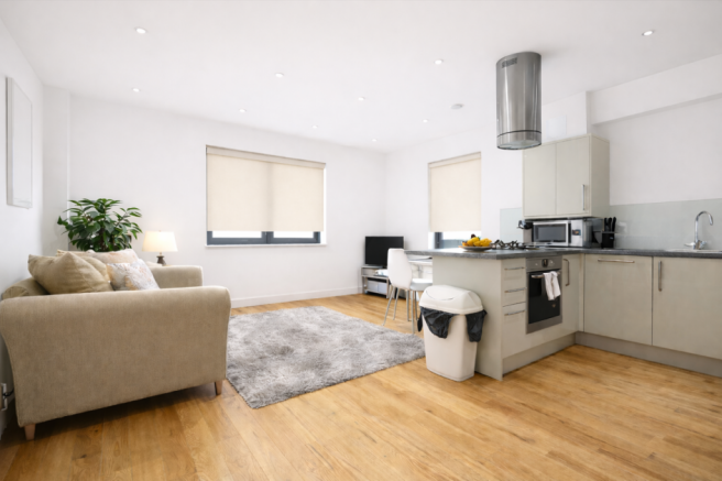 Modern living space with kitchen and natural light