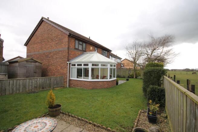 SIDE AND REAR GARDENS