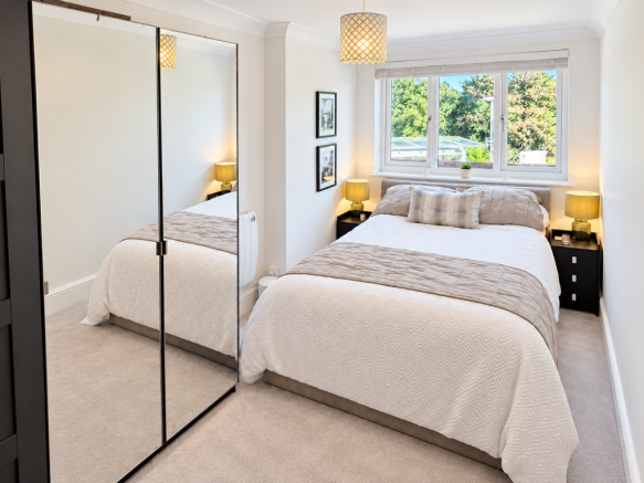 New carpeted bedroom