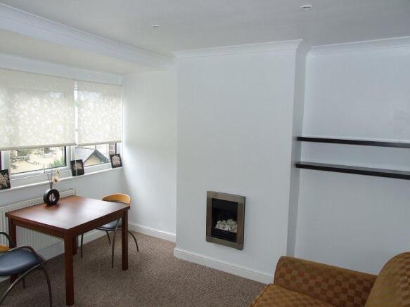 Living room with partial view of river