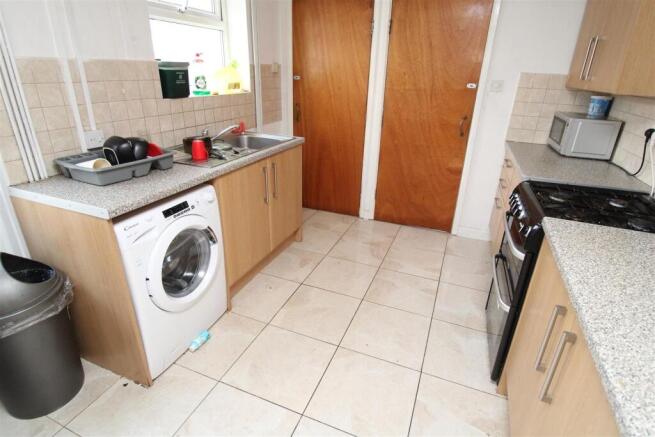 Bright kitchen with ample storage and laundry....