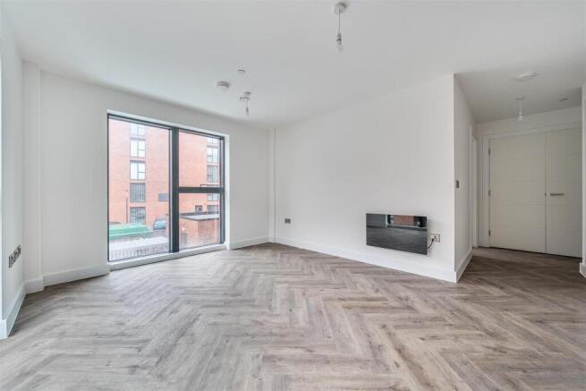 Bright living room with stylish parquet floorin...