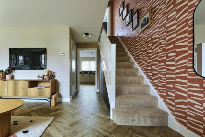 A spacious, light-filled hallway to welcome you home
