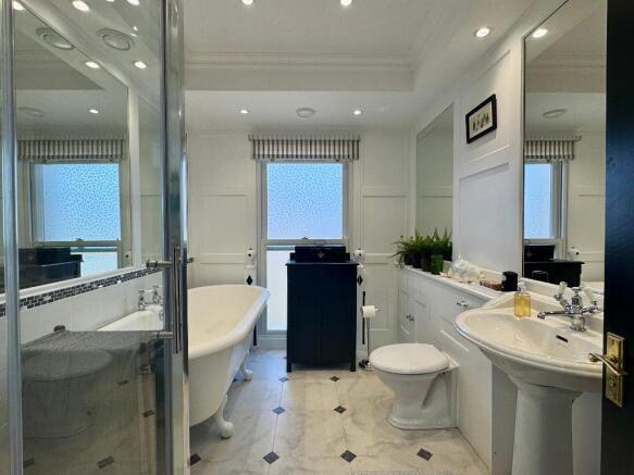 Family bathroom with shower and bath
