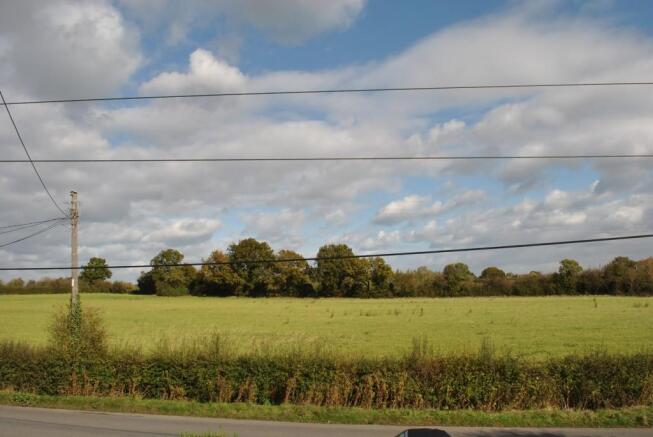 VIEW TO FRONT ACROSS FIELDS