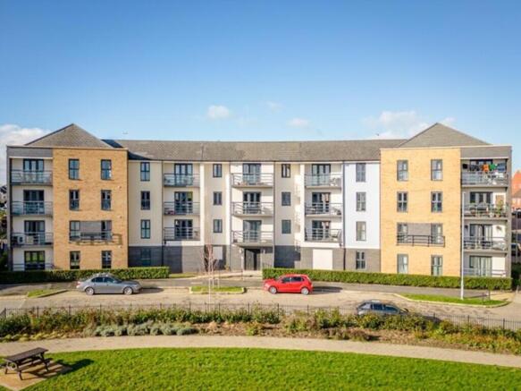 A bright and inviting exterior view of a well-m...