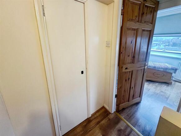 Walk-In Storage/Access Bedroom 3