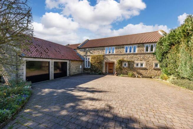 Double Garage & Paved Courtyard