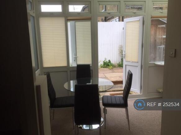 Conservatory Opens Into Back Garden