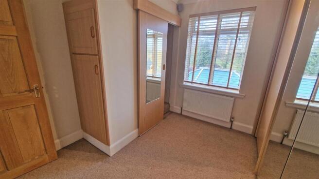 BEDROOM FOUR/DRESSING ROOM