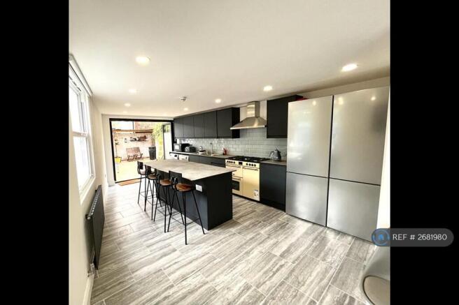 Large Shared Kitchen With An Island