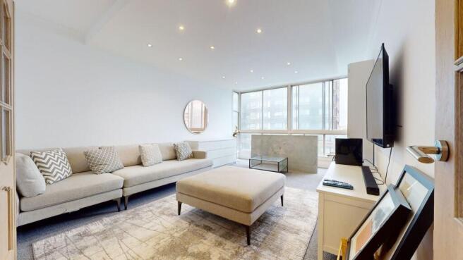 Bright, spacious lounge with modern furnishings...