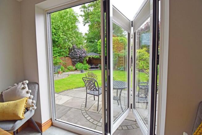 32 Pear Tree Way, garden through bifolds.jpg
