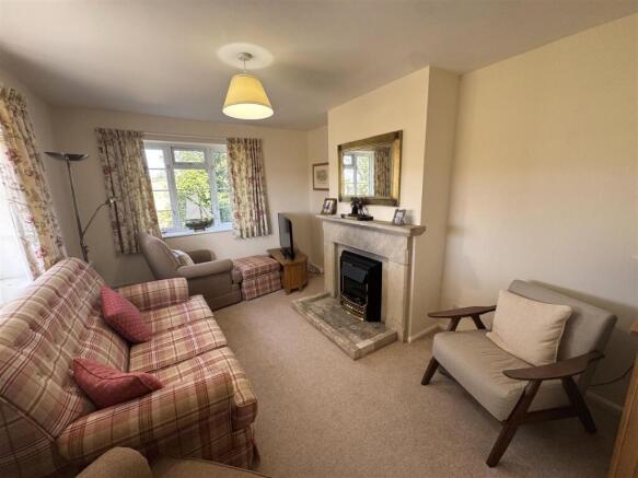 Sitting room with feature fireplace