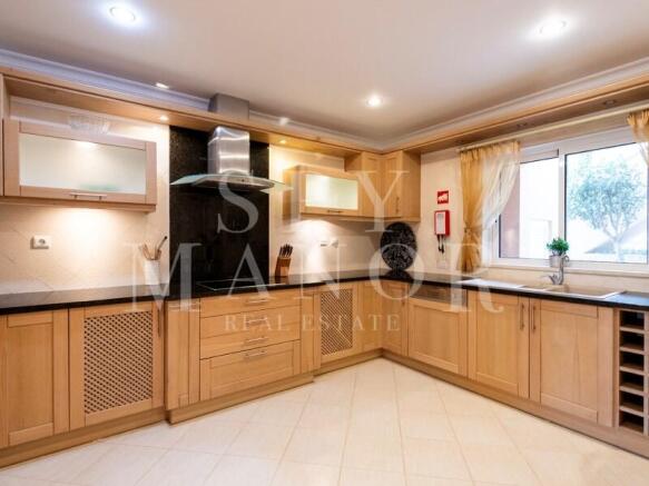 Modern equipped Alno kitchen in luxury townhouse for sale in Ferragudo, Algarve.