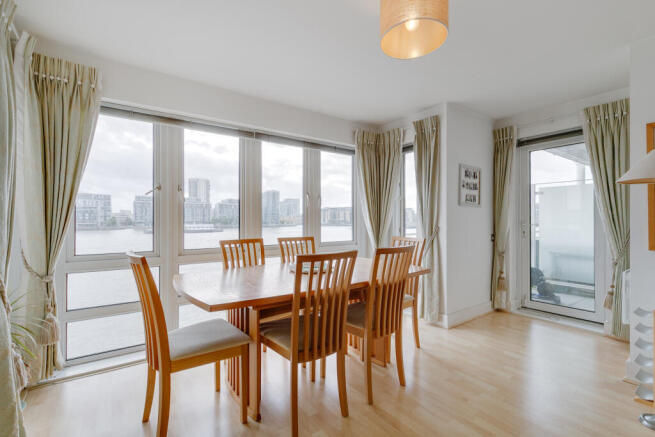 Dining Space with River View and Balcony