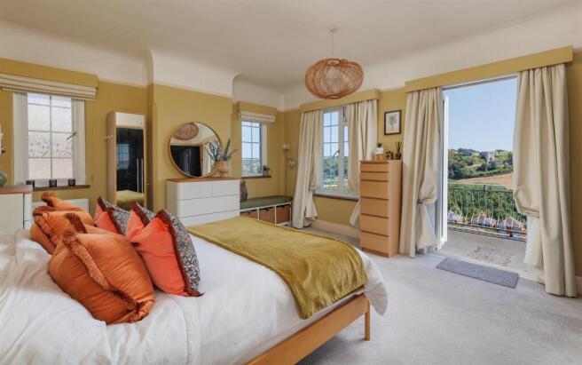 Two bedrooms with access to rear balcony