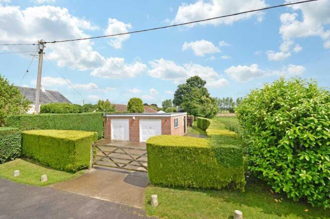 Path to double garage