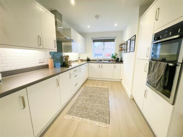 ALTERNATE VIEW OF KITCHEN AREA