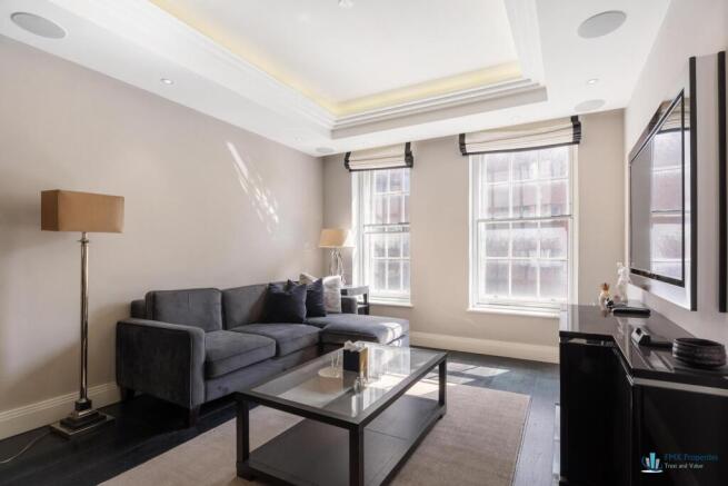 Spacious reception room with sash windows