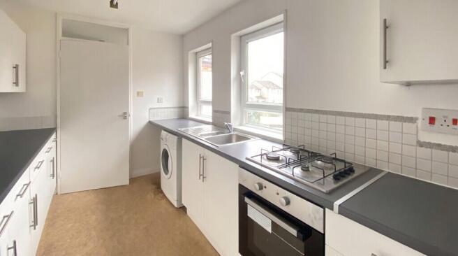 Kitchen with whit...
