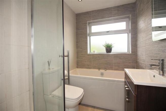 REFITTED FOUR-PIECE BATHROOM