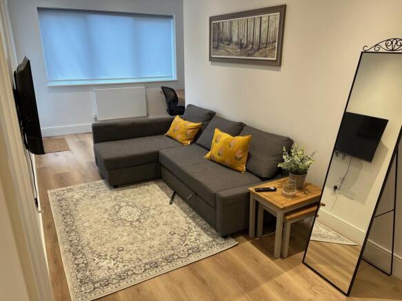 Sitting area AND DOORS TO BALCONY