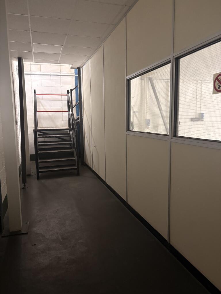 Lobby between warehouse and office accomodation with access to mezzanine