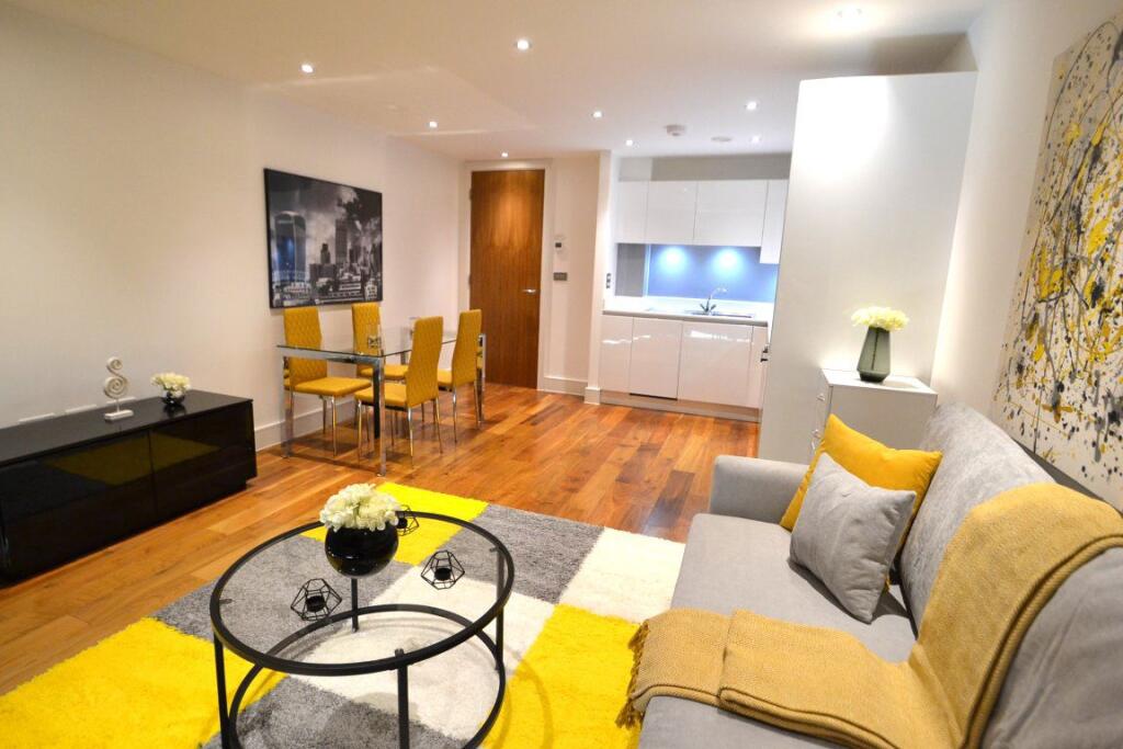 Main image of property: Lovely, Spacious 1 Bed with Communal Roof Terrace
