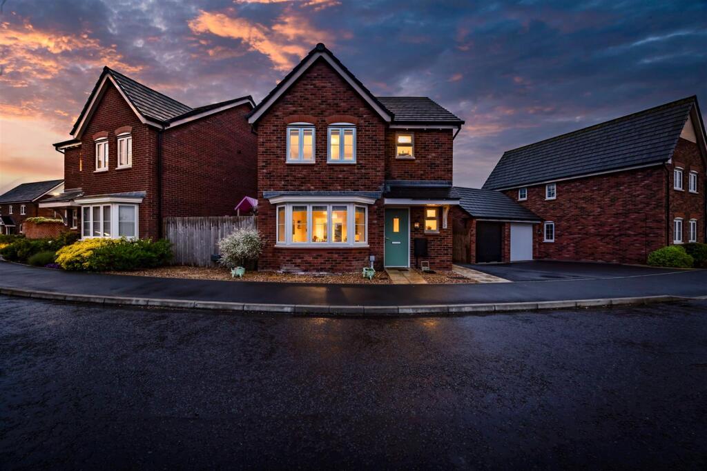 Main image of property: Impeccably stylish detached property on a prized development within a semi-rural village